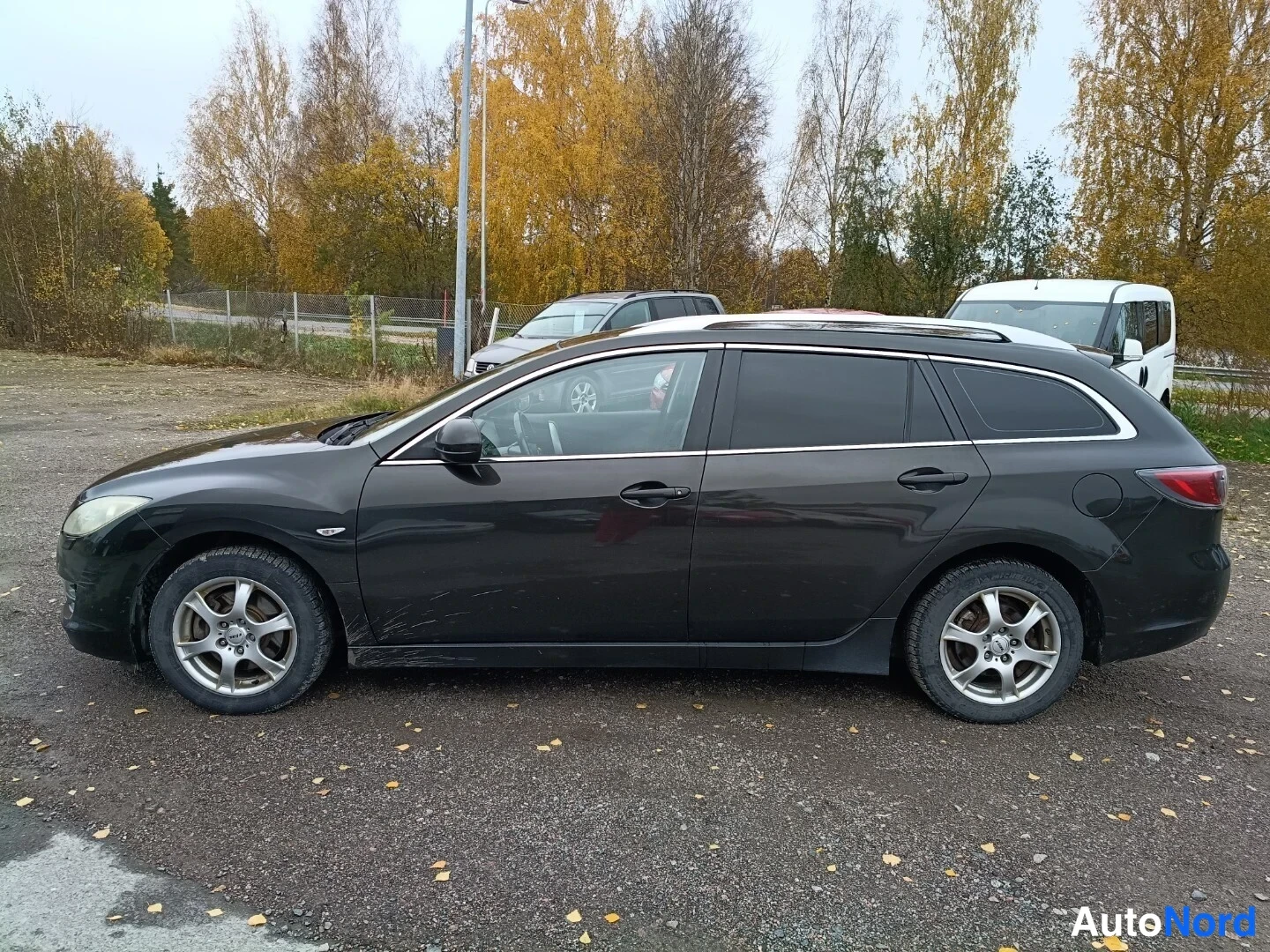 Musta Mazda 6 2008, etuviisto, keula vasemmalle, kuva 2