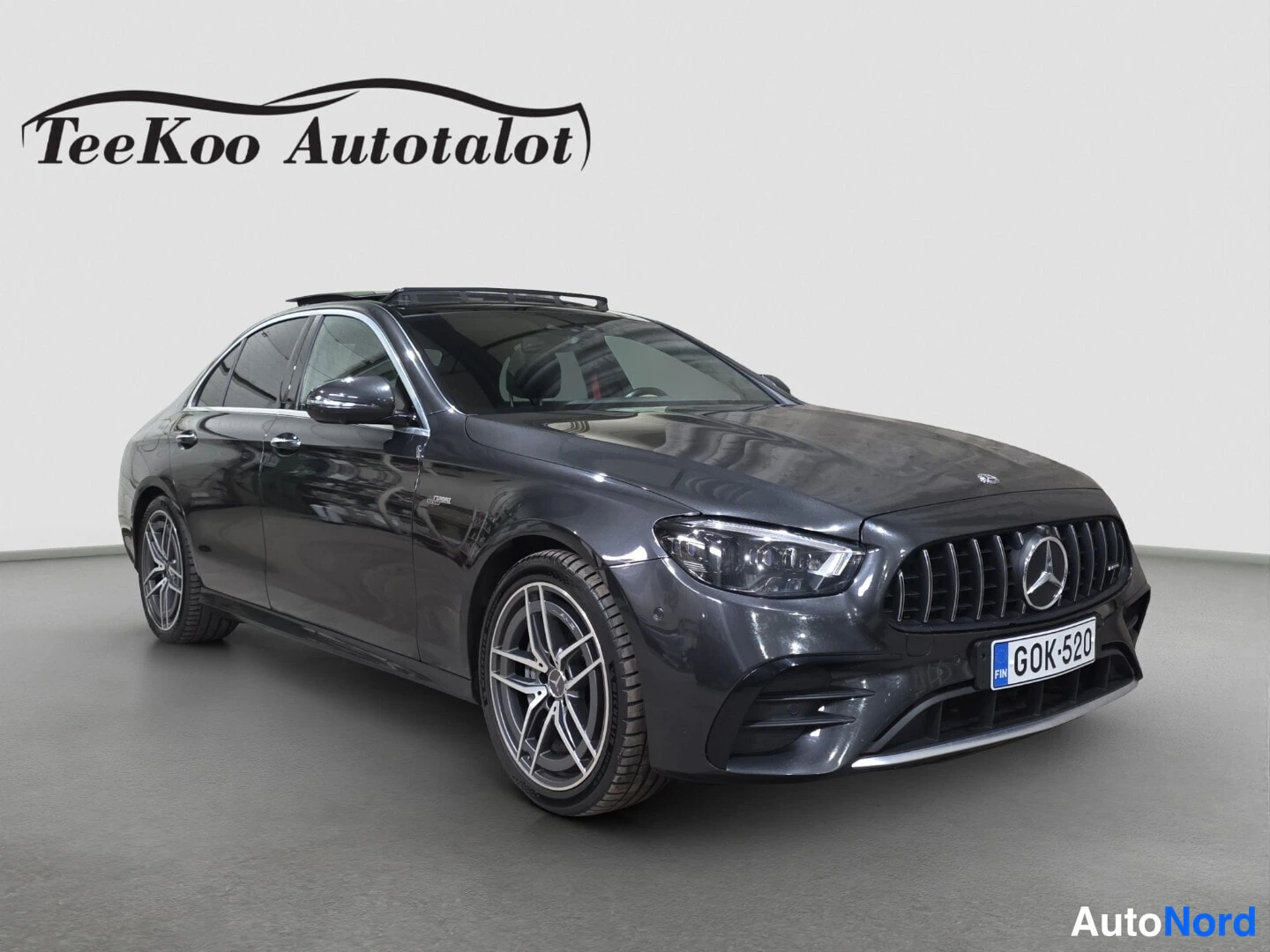 Black Mercedes-Benz E 53 2021, front three-quarter, nose to the right, photo 2