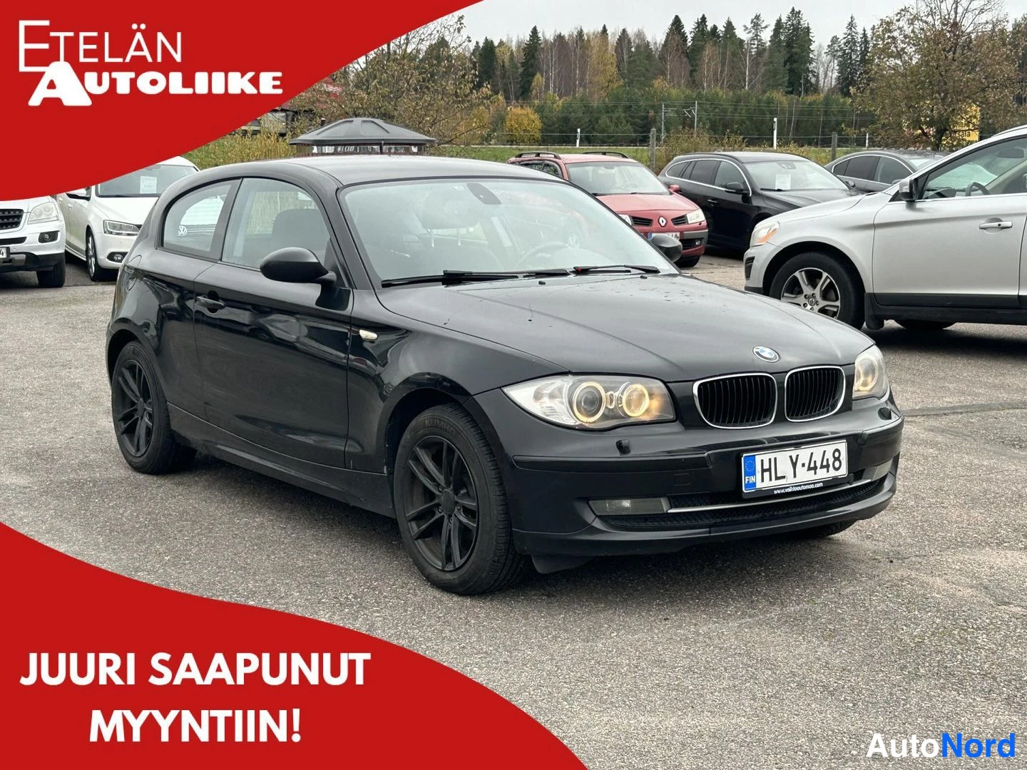 Musta BMW 116d 2009, etuviisto, keula oikealle, kuva 2