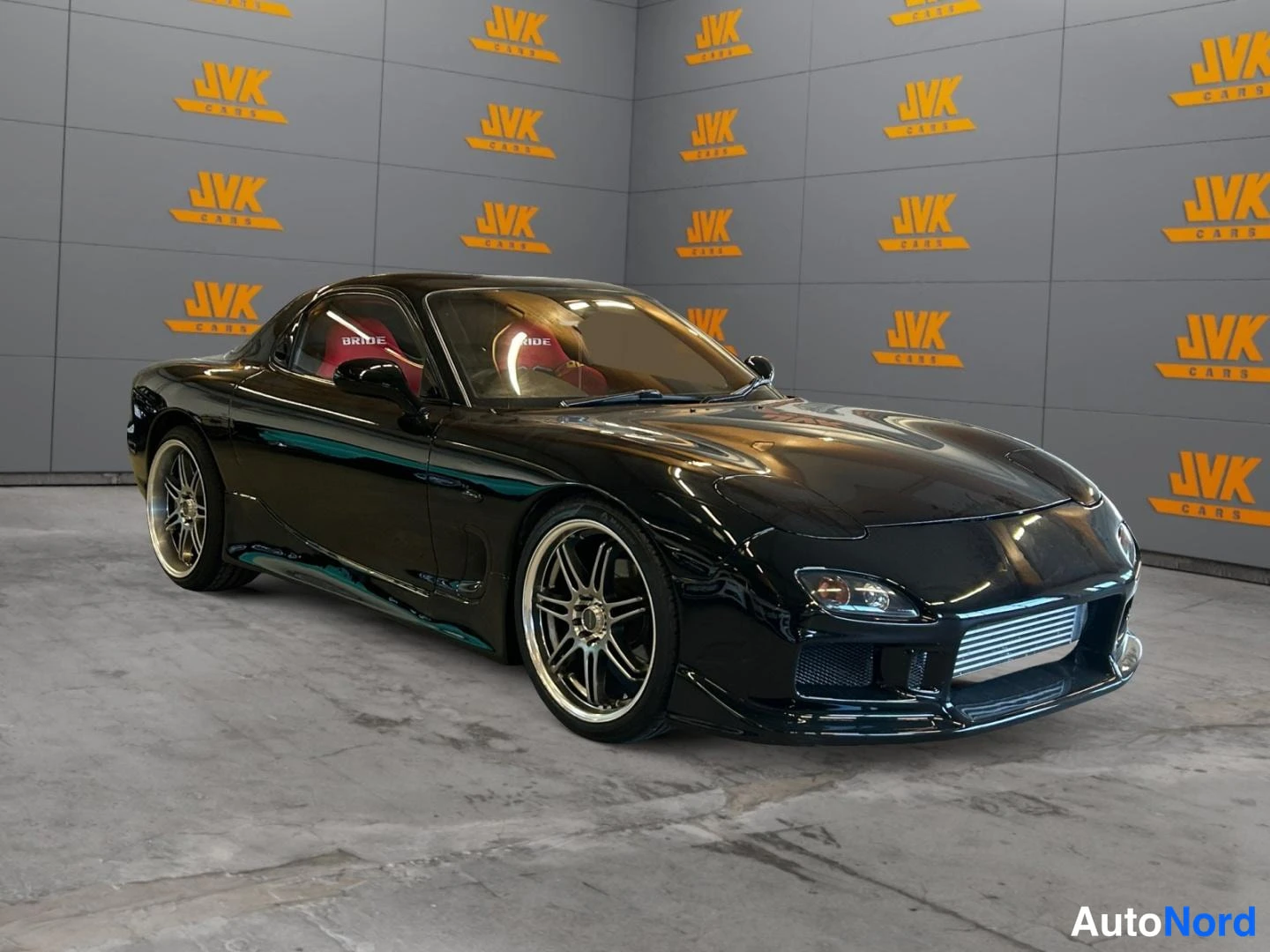 Black Mazda RX-7 1992, front three-quarter, nose to the right, photo 2