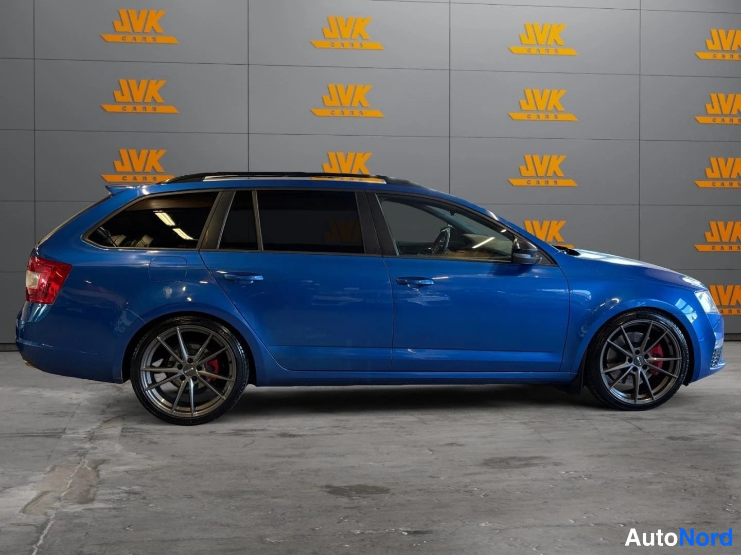 Blue Skoda Octavia 2014, rear three-quarter, photo 3