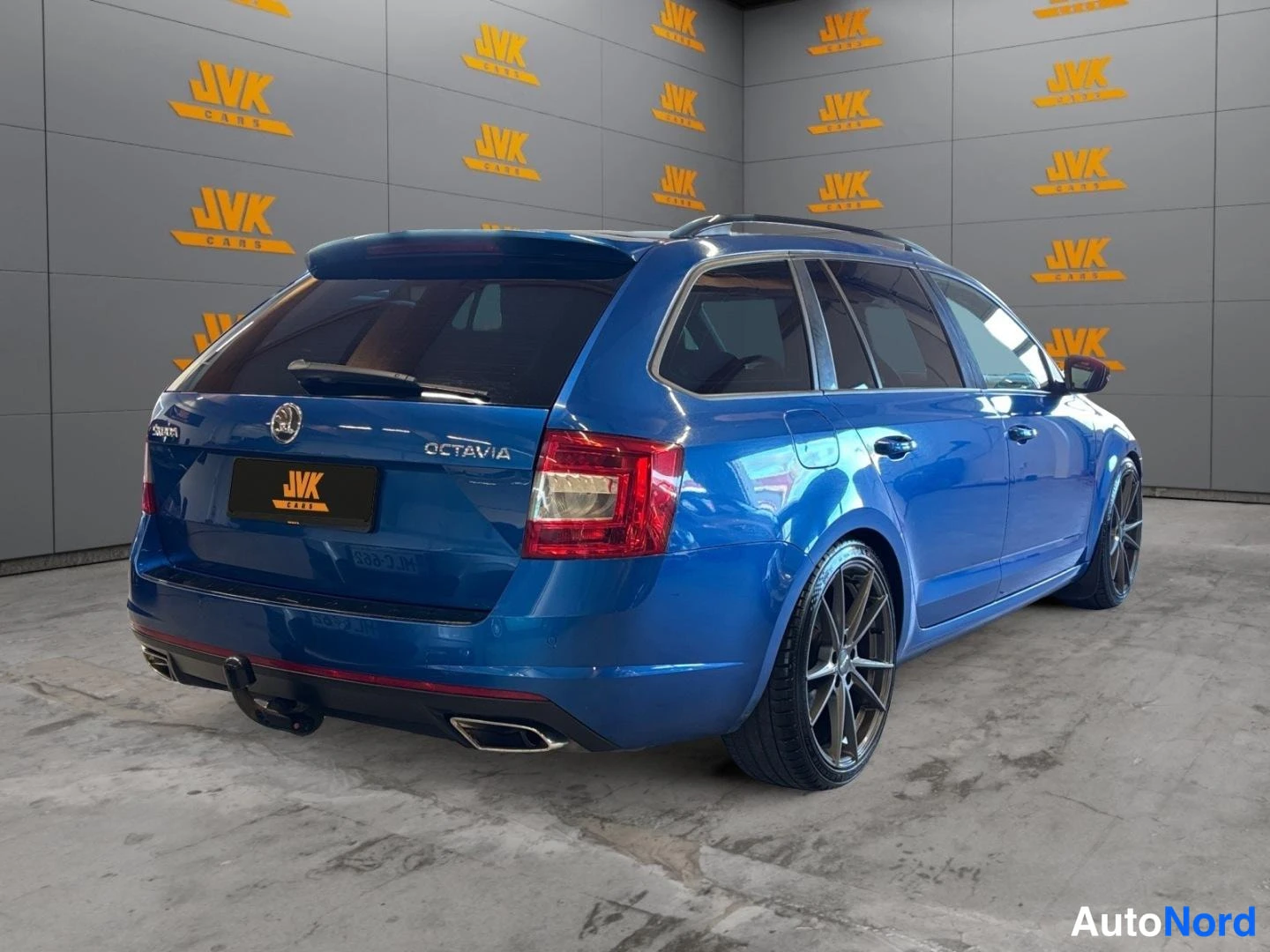 Blue Skoda Octavia 2014, rear three-quarter, photo 4