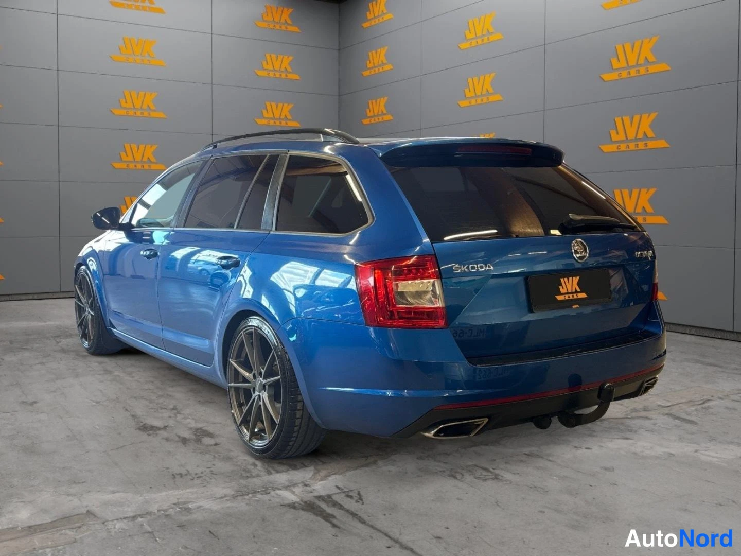 Blue Skoda Octavia 2014, rear three-quarter, photo 5