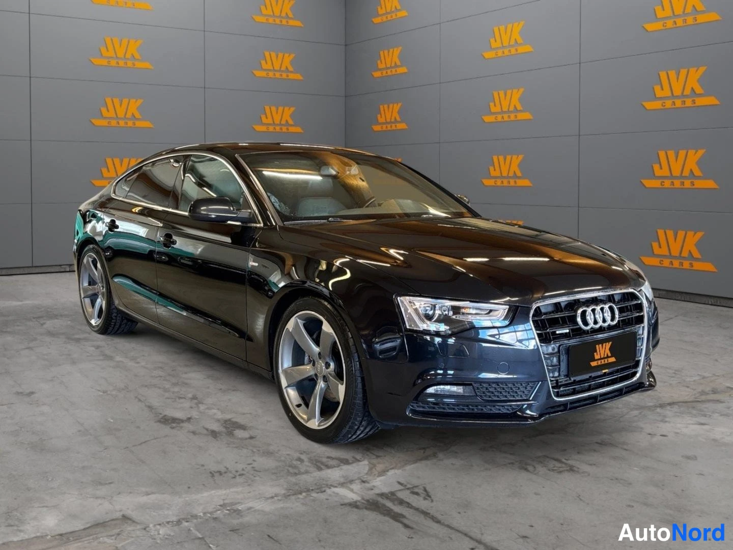 Black Audi A5 2012, front three-quarter, nose to the right, photo 3