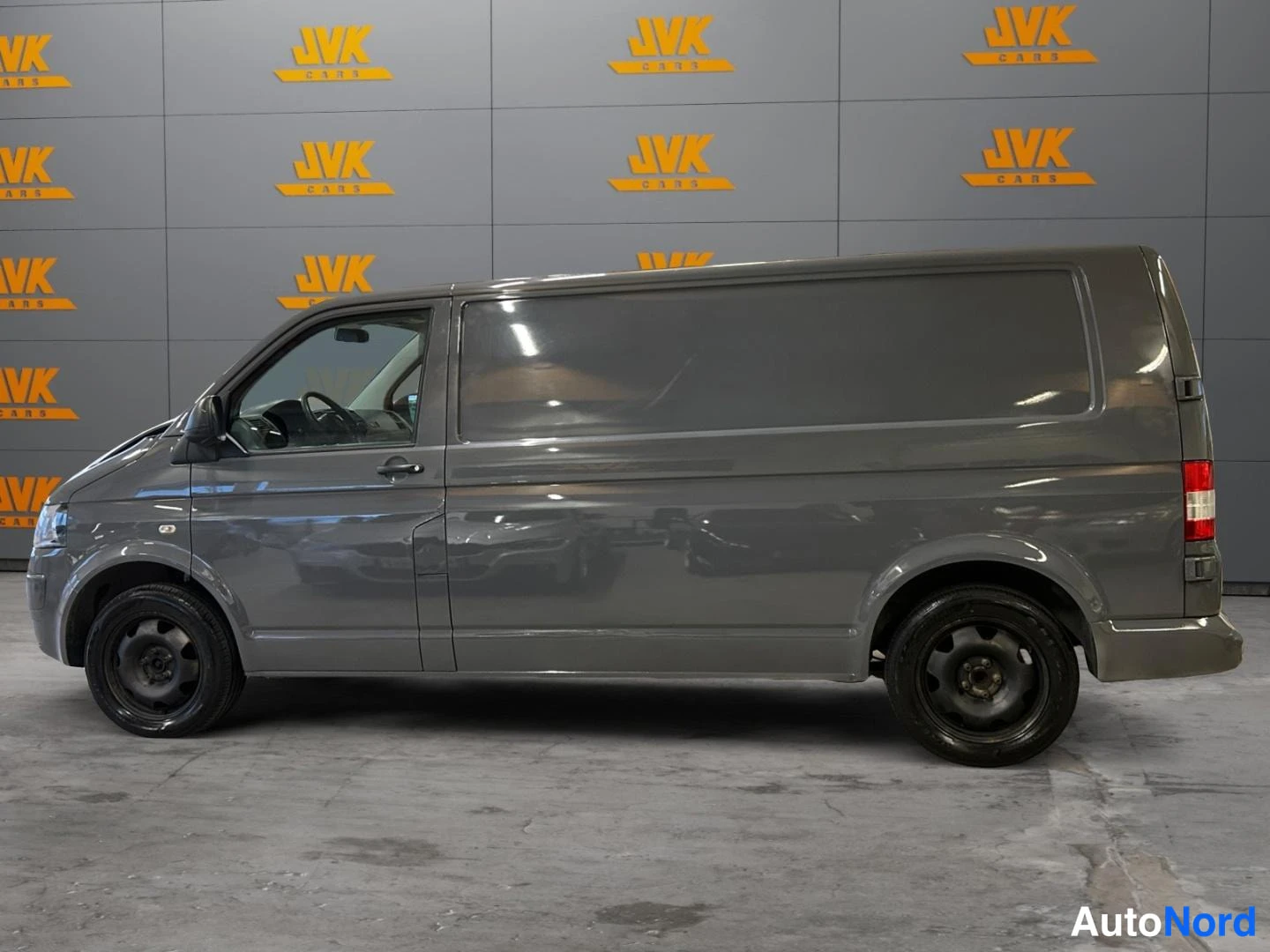 Grey Volkswagen Transporter 2010, front three-quarter, nose to the left, photo 2
