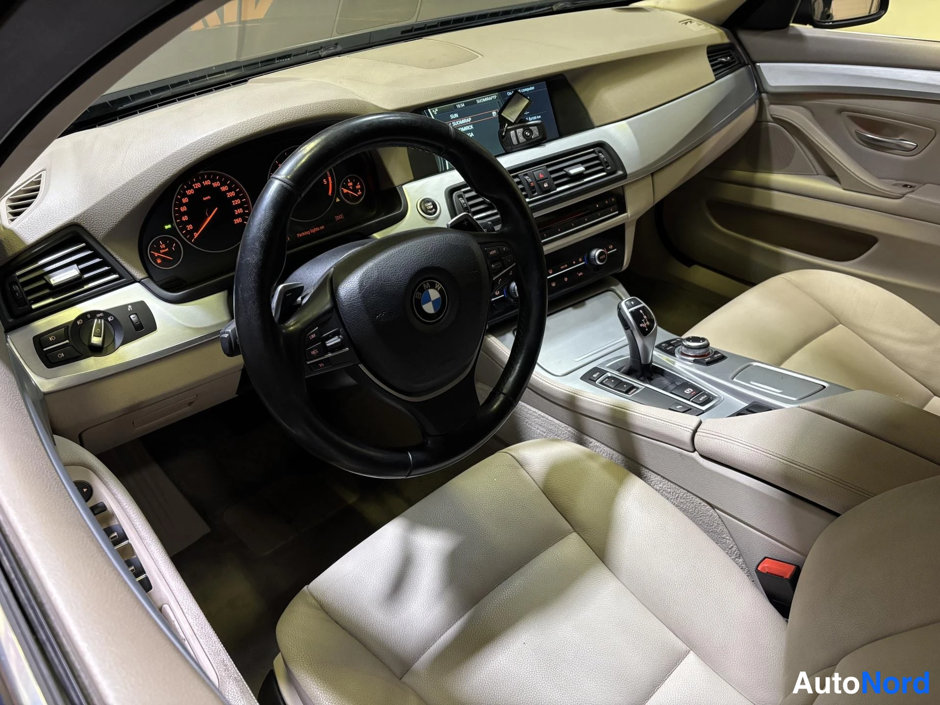 Blue BMW 530d 2011, cockpit, photo 7