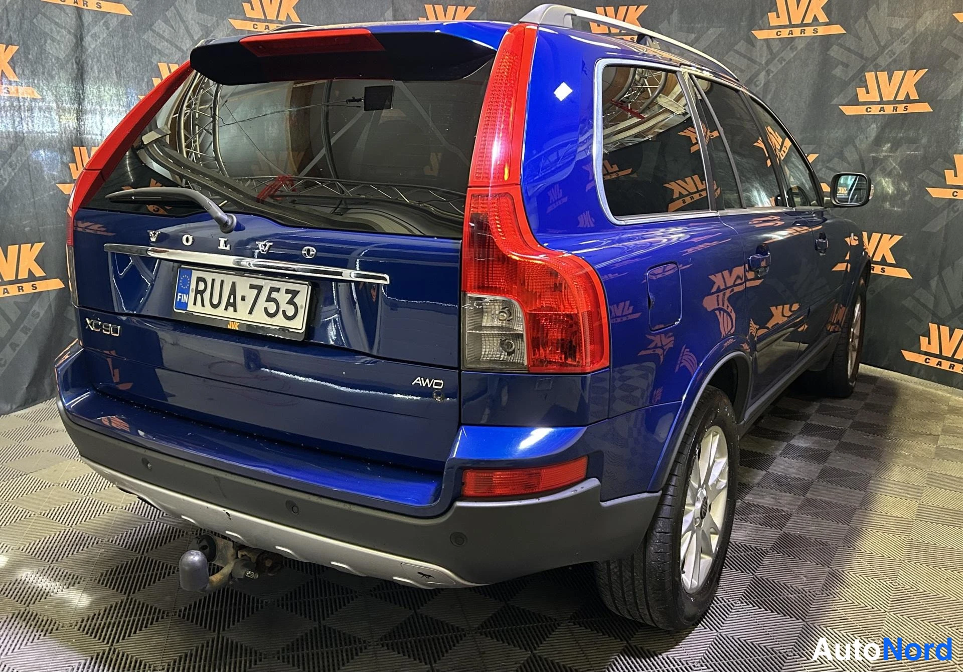 Blue Volvo XC90 2009, rear three-quarter, photo 3