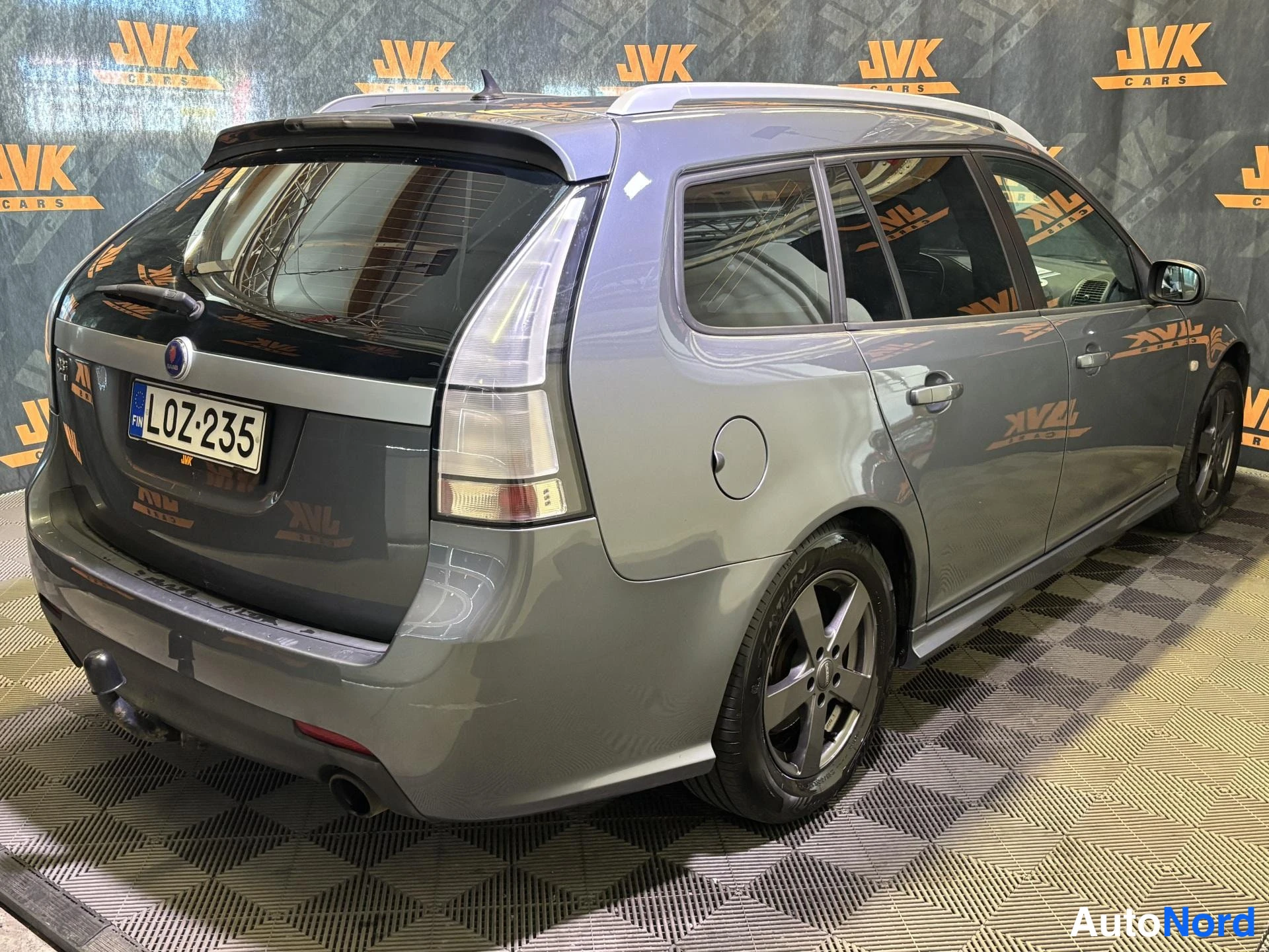 Grey Saab 9-3 2009, rear three-quarter, photo 3