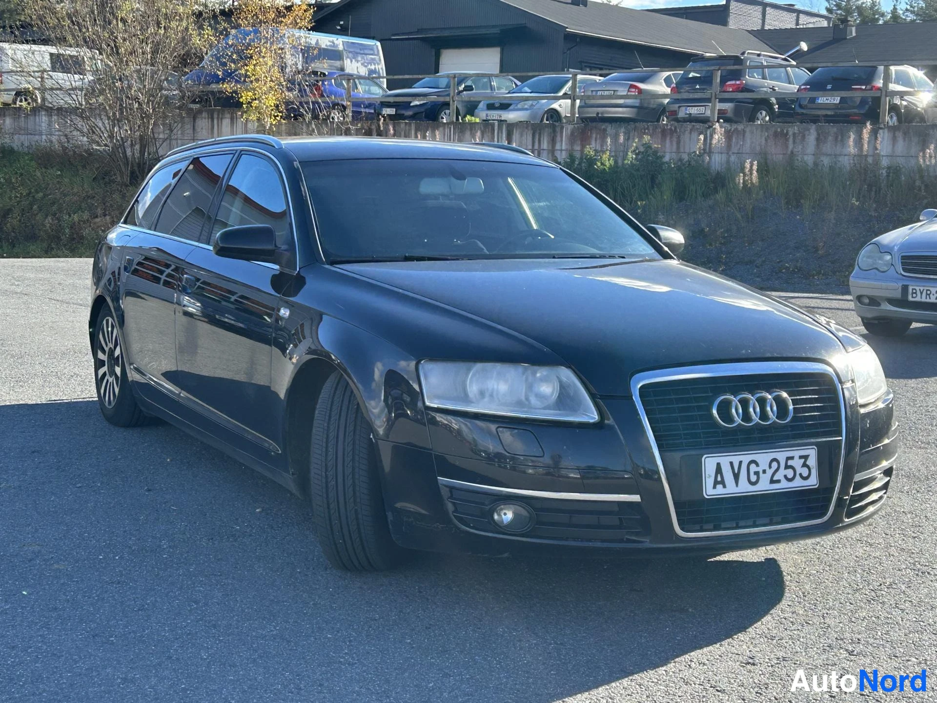 Black Audi A6 2006, front three-quarter, nose to the right, photo 2