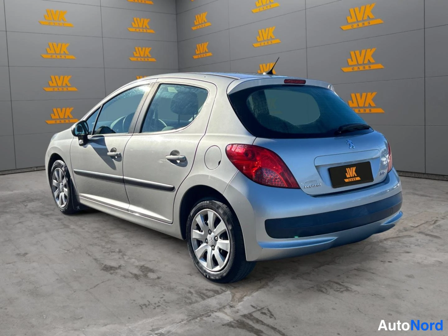 Grey Peugeot 207 2007, rear three-quarter, photo 6