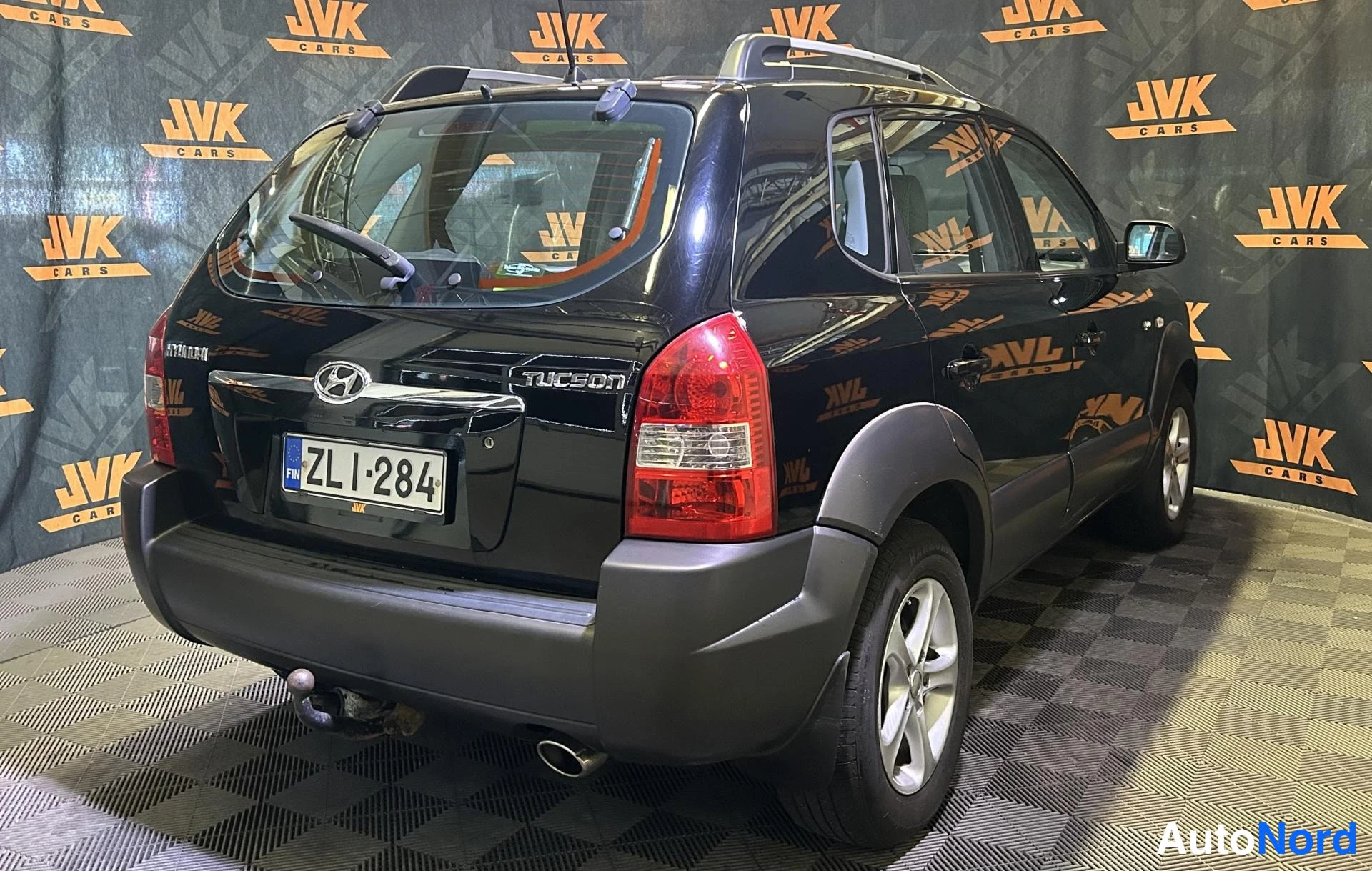 Black Hyundai Tucson 2006, rear three-quarter, photo 3