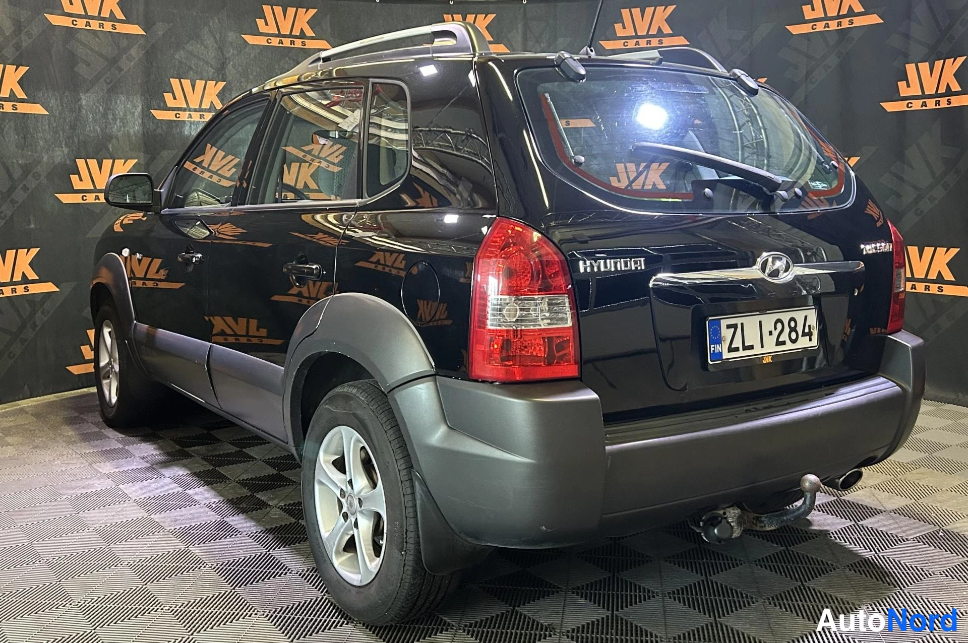Black Hyundai Tucson 2006, rear three-quarter, photo 4