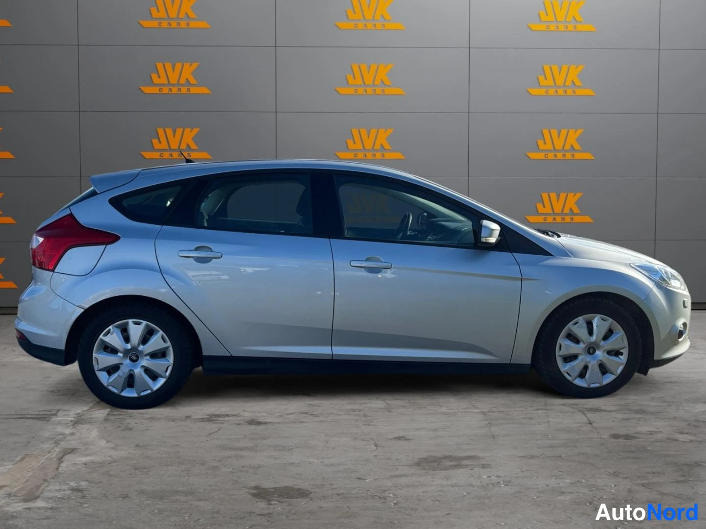 Grey Ford Focus 2012, rear three-quarter, photo 4