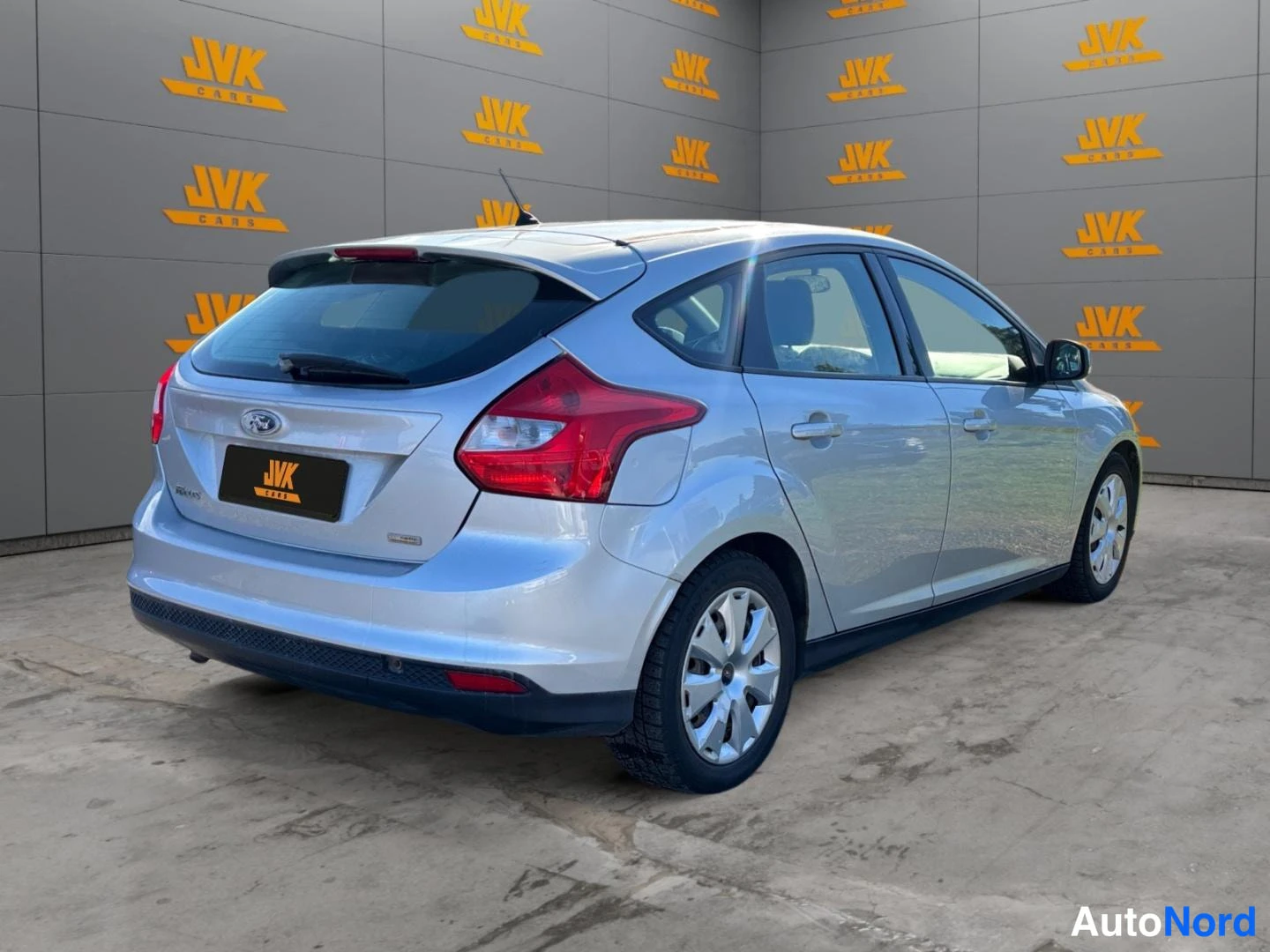 Grey Ford Focus 2012, rear three-quarter, photo 5