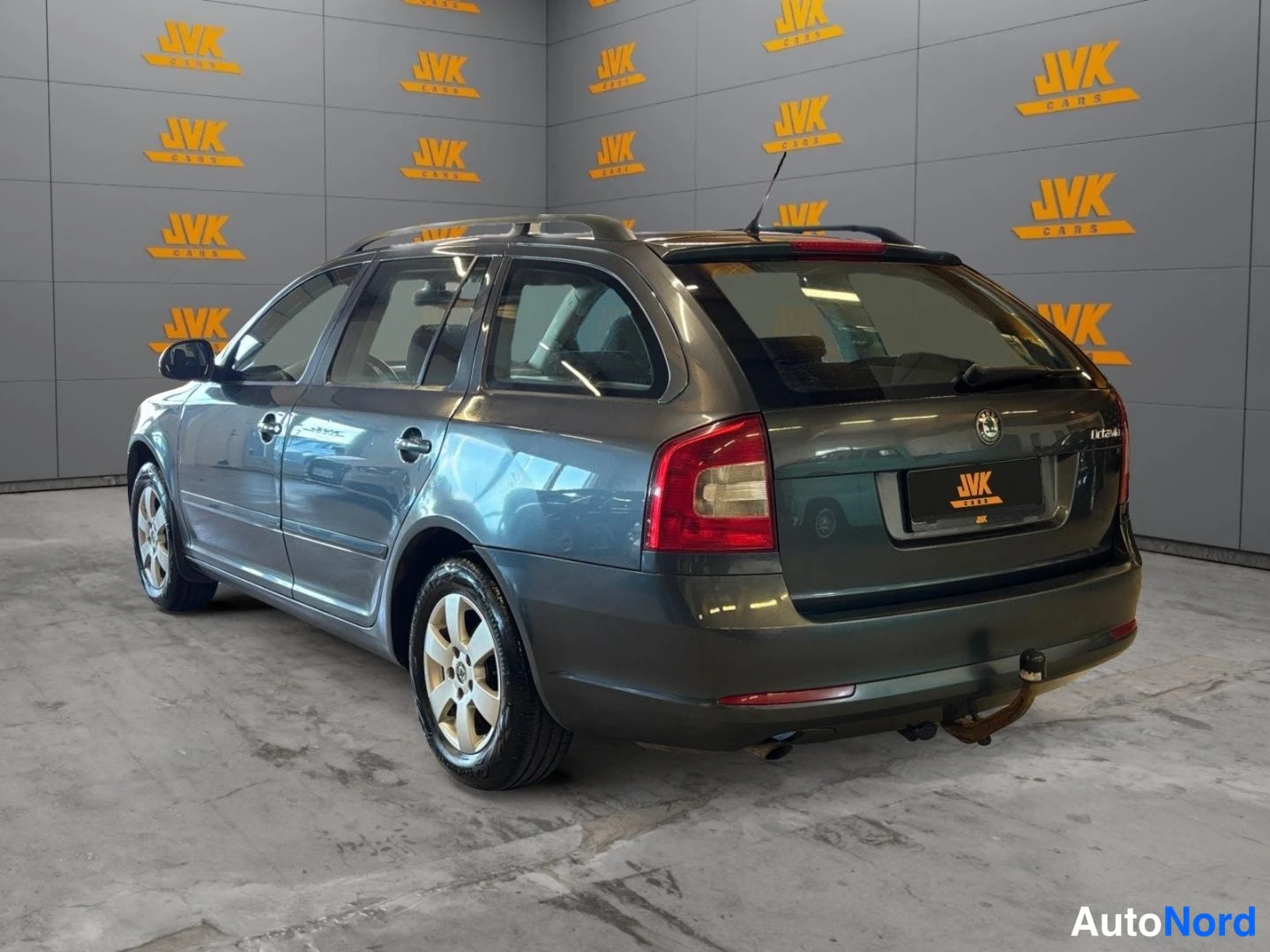 Grey Skoda Octavia 2011, rear three-quarter, photo 6