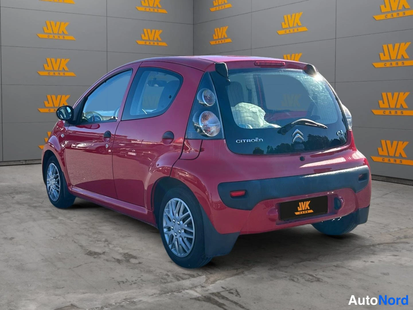 Red Citroen C1 2012, rear three-quarter, photo 6