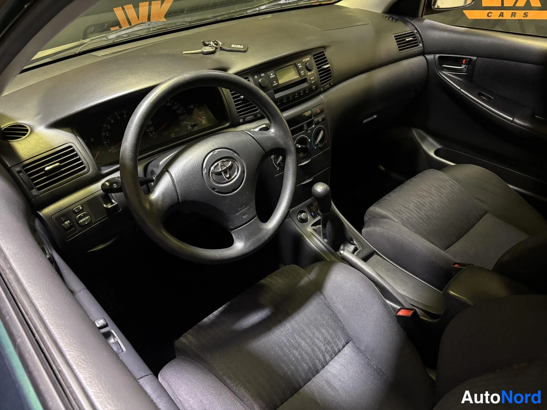 Green Toyota Corolla 2002, cockpit, photo 5