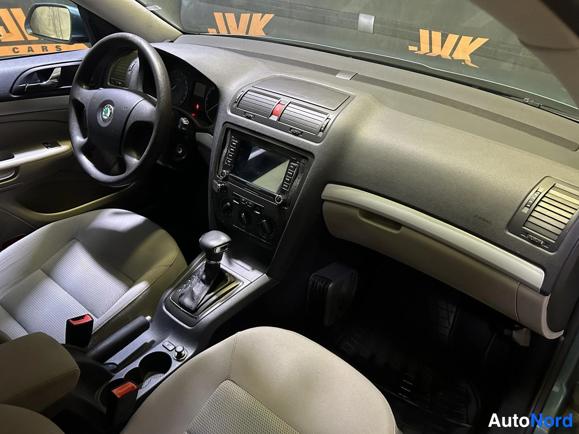 Green Skoda Octavia 2007, cockpit, photo 7