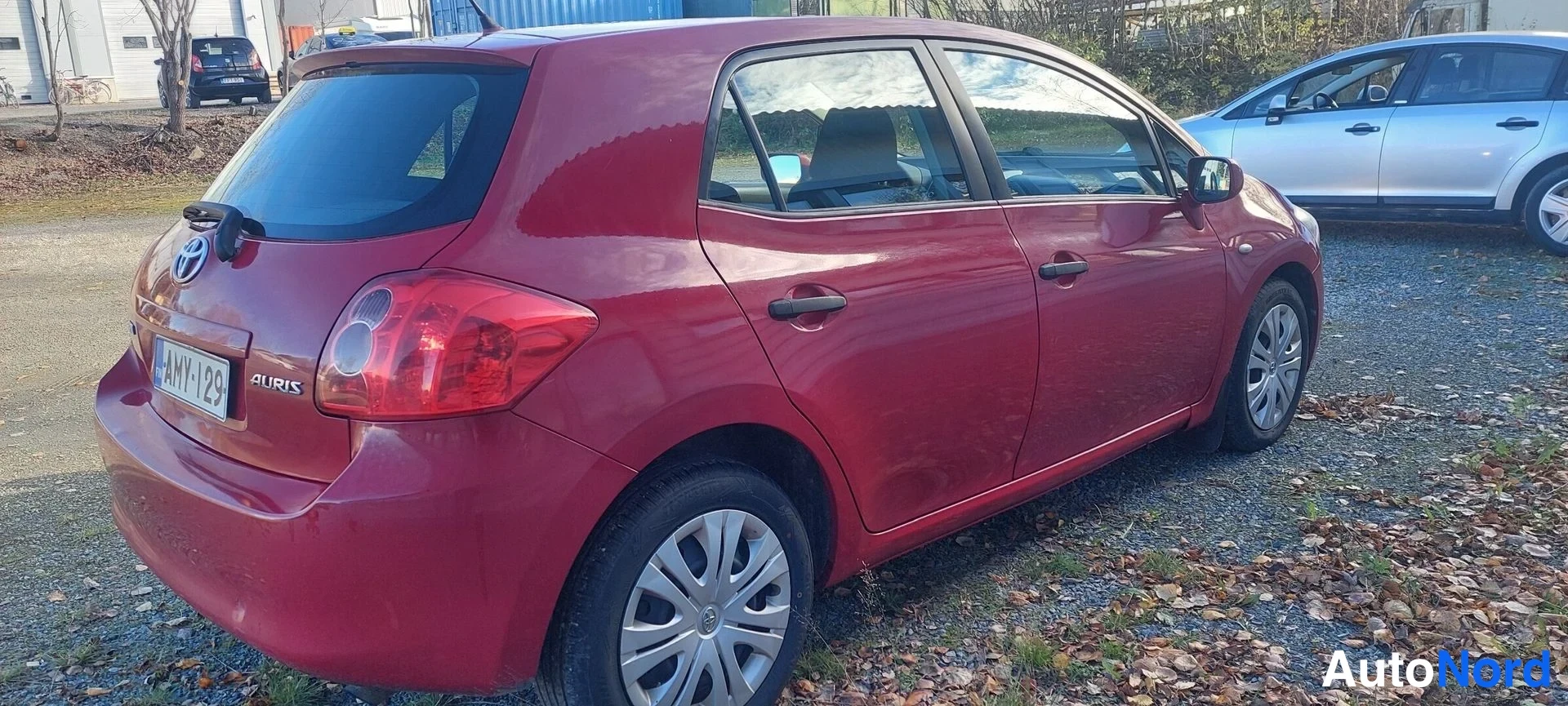 Red Toyota Auris 2008, rear three-quarter, photo 3
