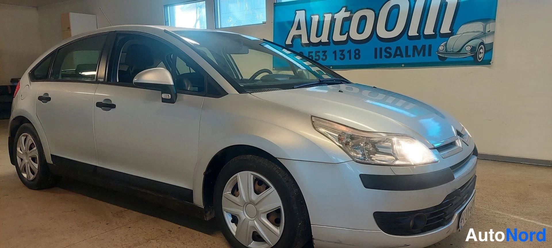 Beige Citroen C4 2007, etuviisto, keula oikealle, kuva 2