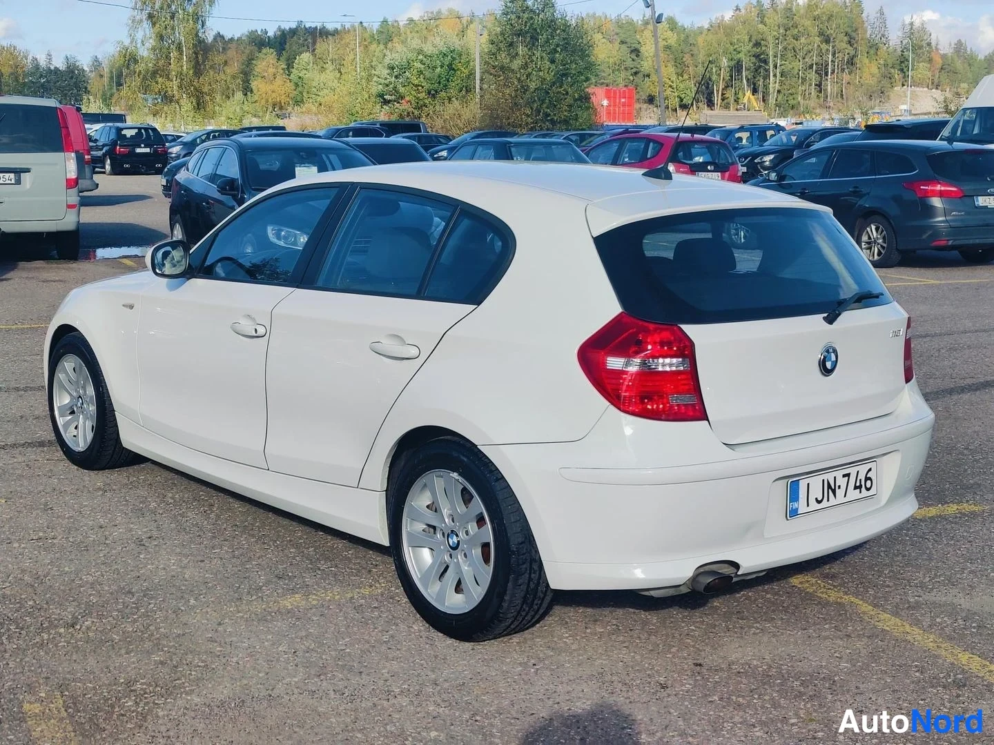 White BMW 116i 2010, rear three-quarter, photo 5