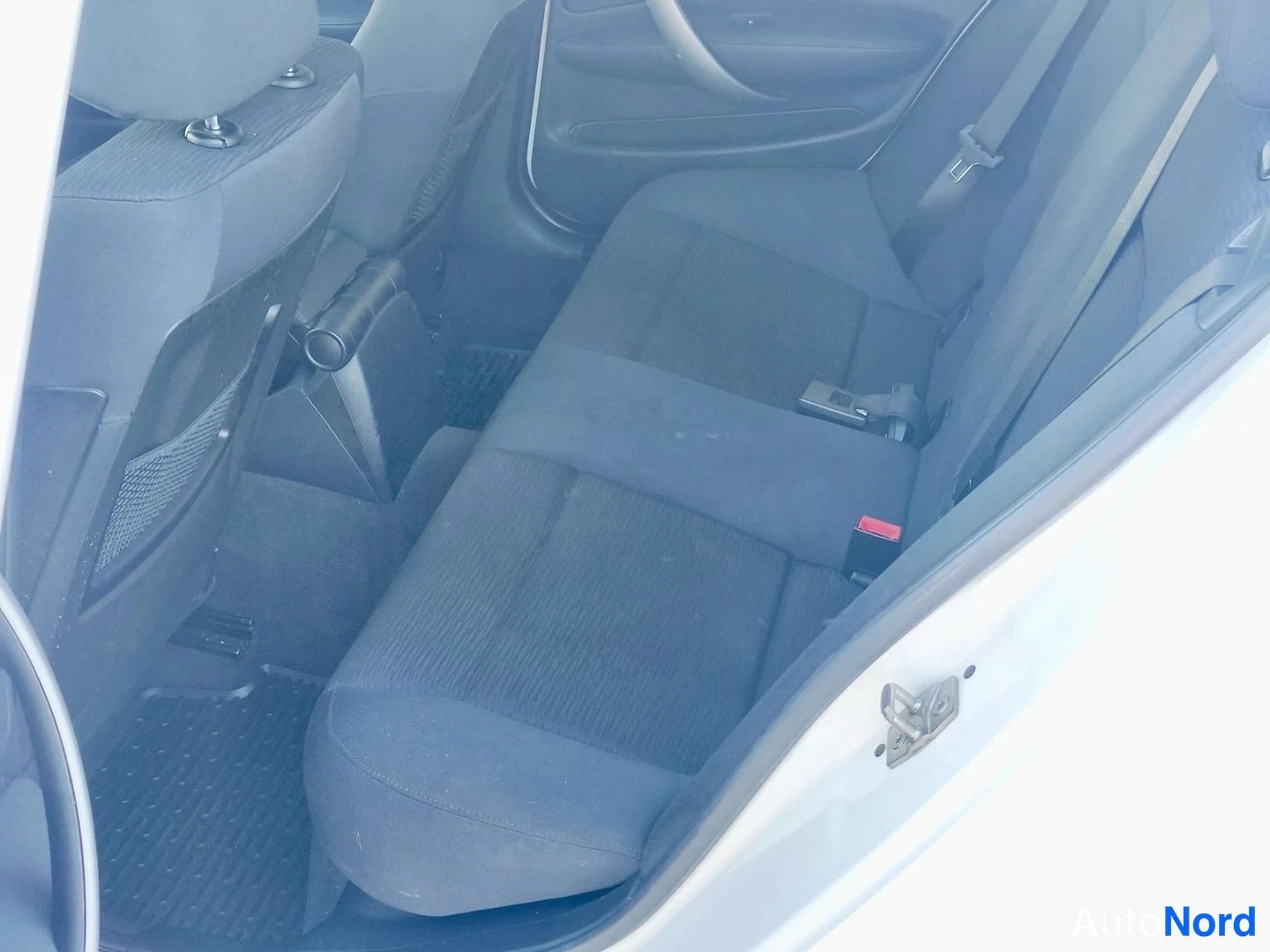 White BMW 116i 2010, rear seats, photo 7