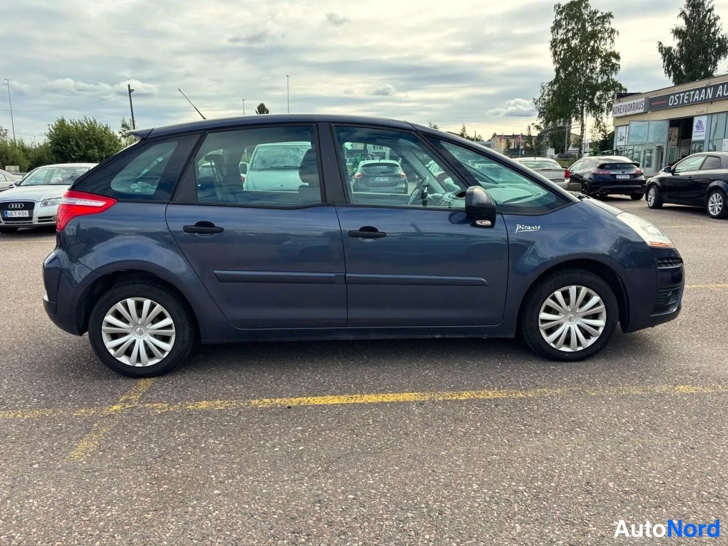 Blå Citroen C4 Picasso 2010, från sidan, bild 6