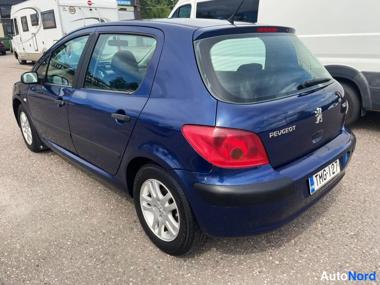 Blå Peugeot 307 2004, snett bakifrån, bild 7