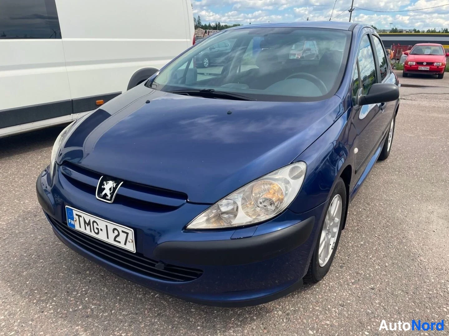 Blå Peugeot 307 2004, snett framifrån, fronten åt vänster, bild 4