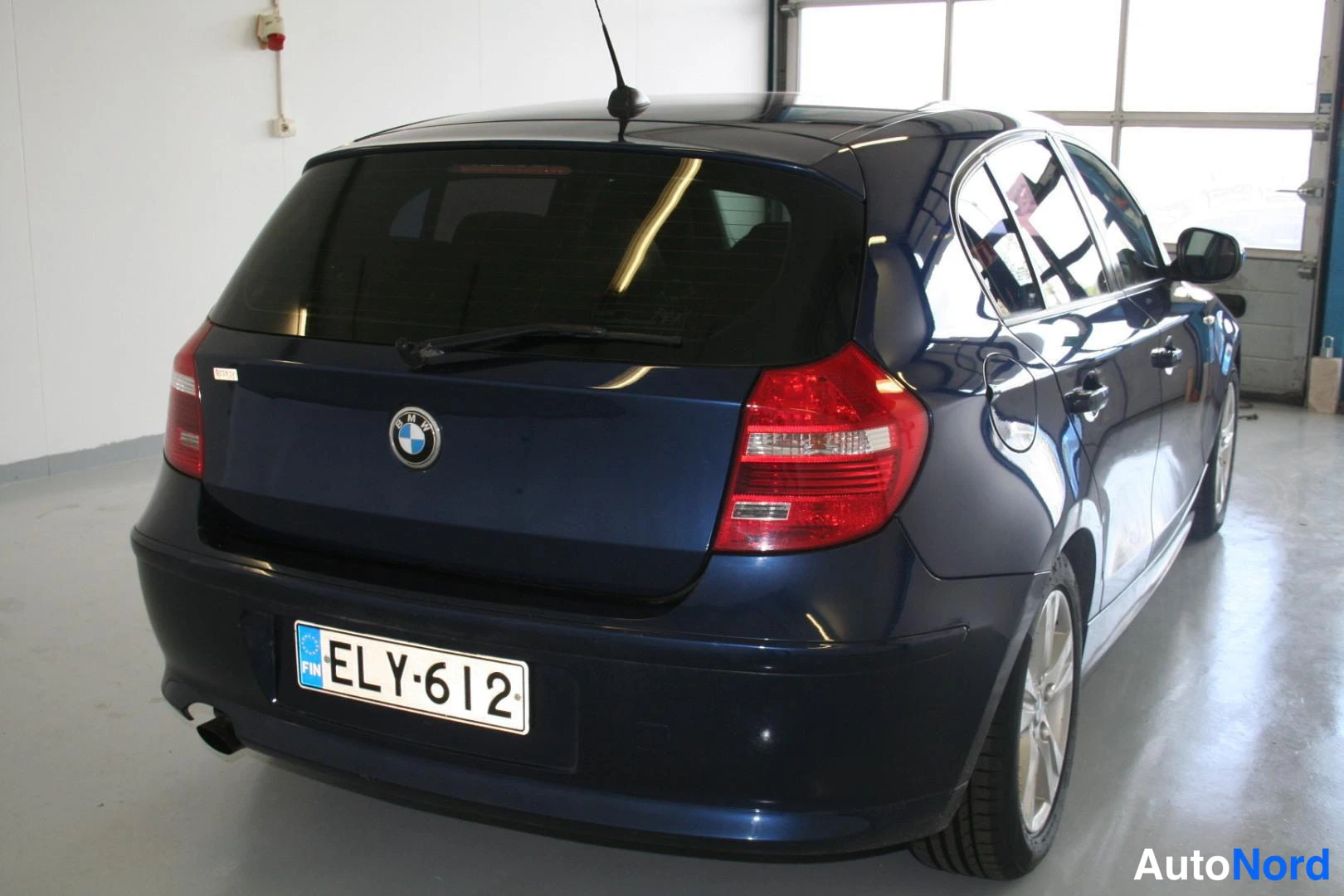 Sininen BMW 116i 2011, takaviisto, kuva 11