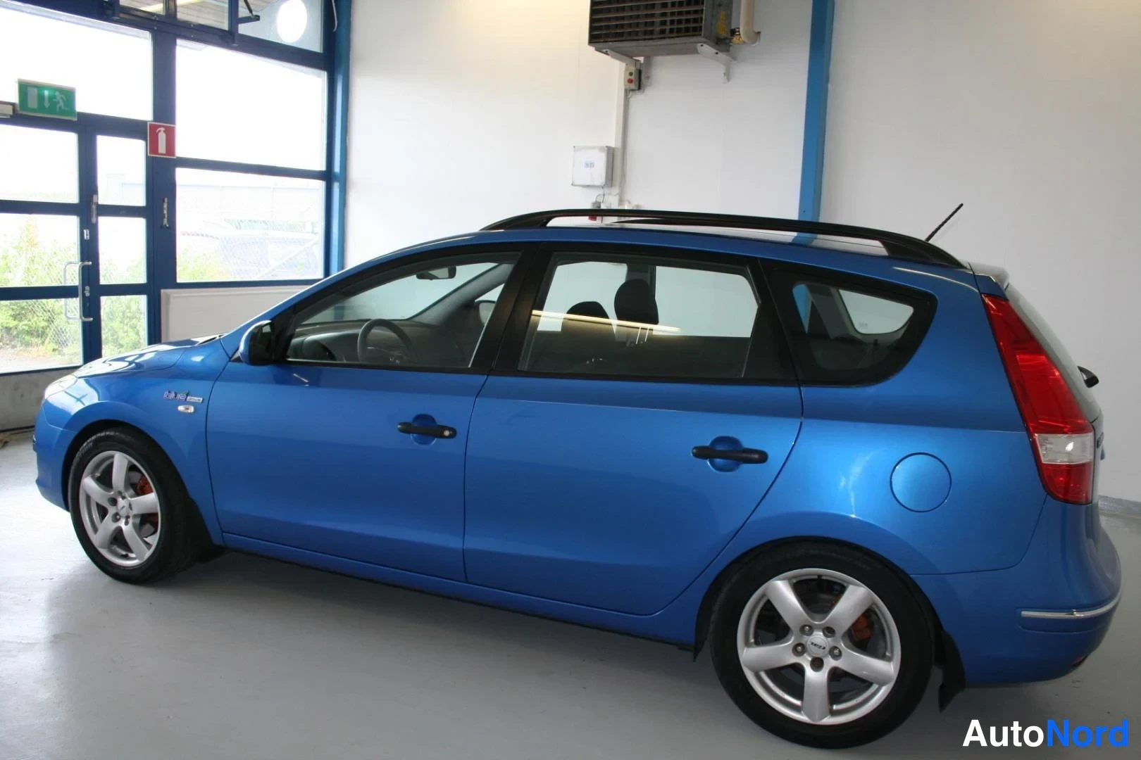 Sininen Hyundai i30 2010, takaviisto, kuva 3