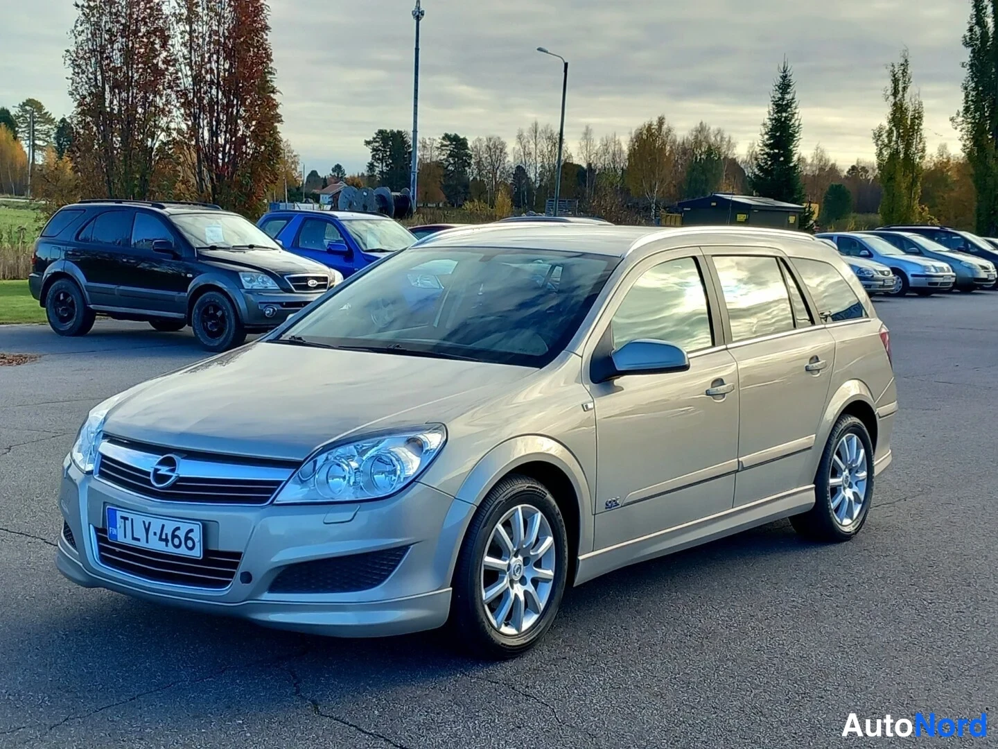 Beige Opel Astra OPC 2007, etuviisto, keula vasemmalle, kuva 4