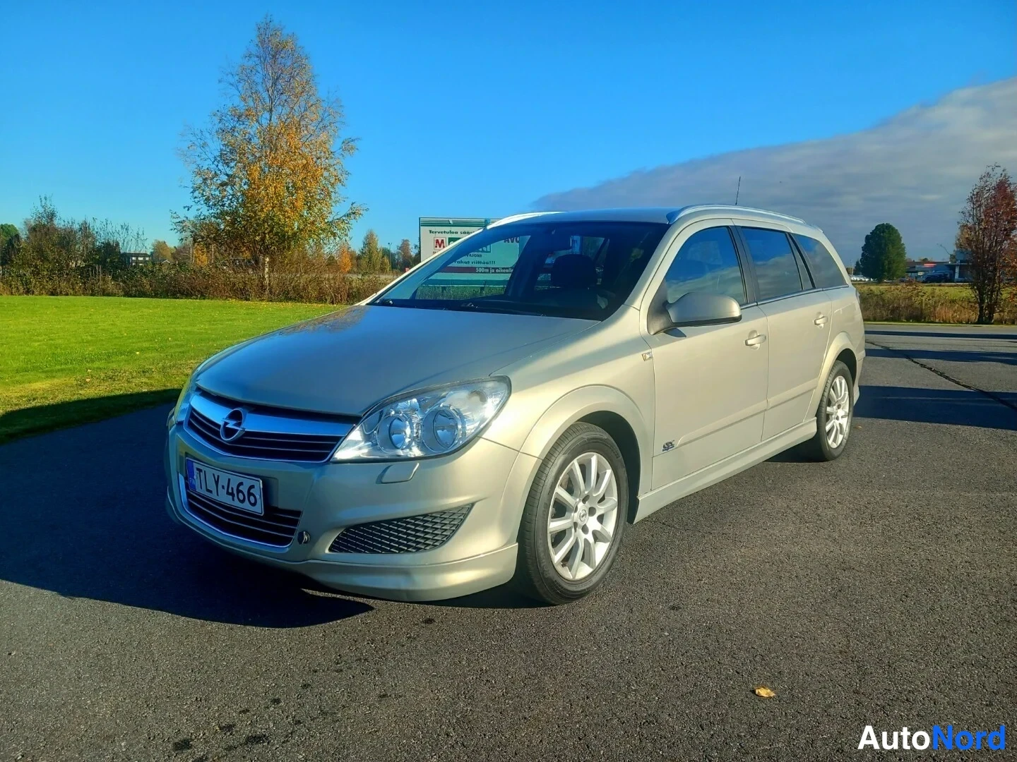 Beige Opel Astra OPC 2007, etuviisto, keula vasemmalle, kuva 2