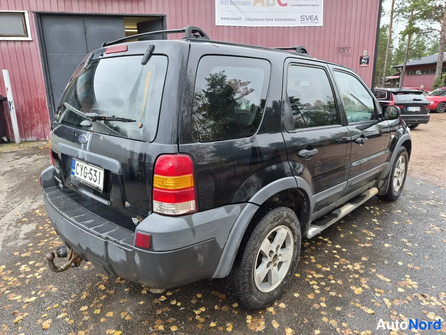 Musta Ford Maverick 2004, takaviisto, kuva 7
