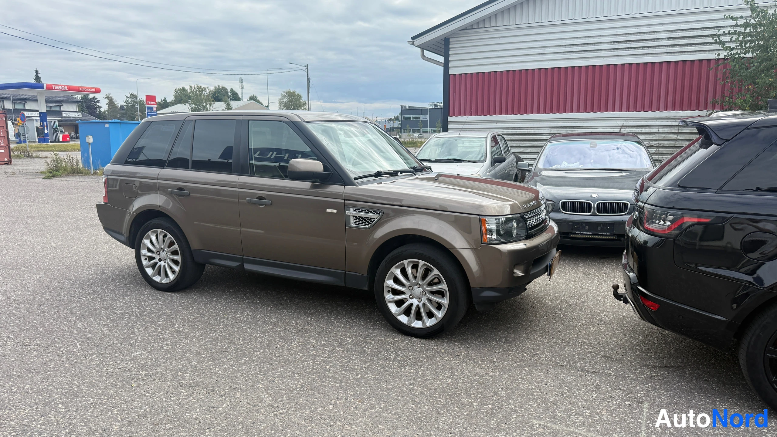 Ruskea Land Rover RANGE ROVER SPORT 2012, etuviisto, keula oikealle, kuva 2