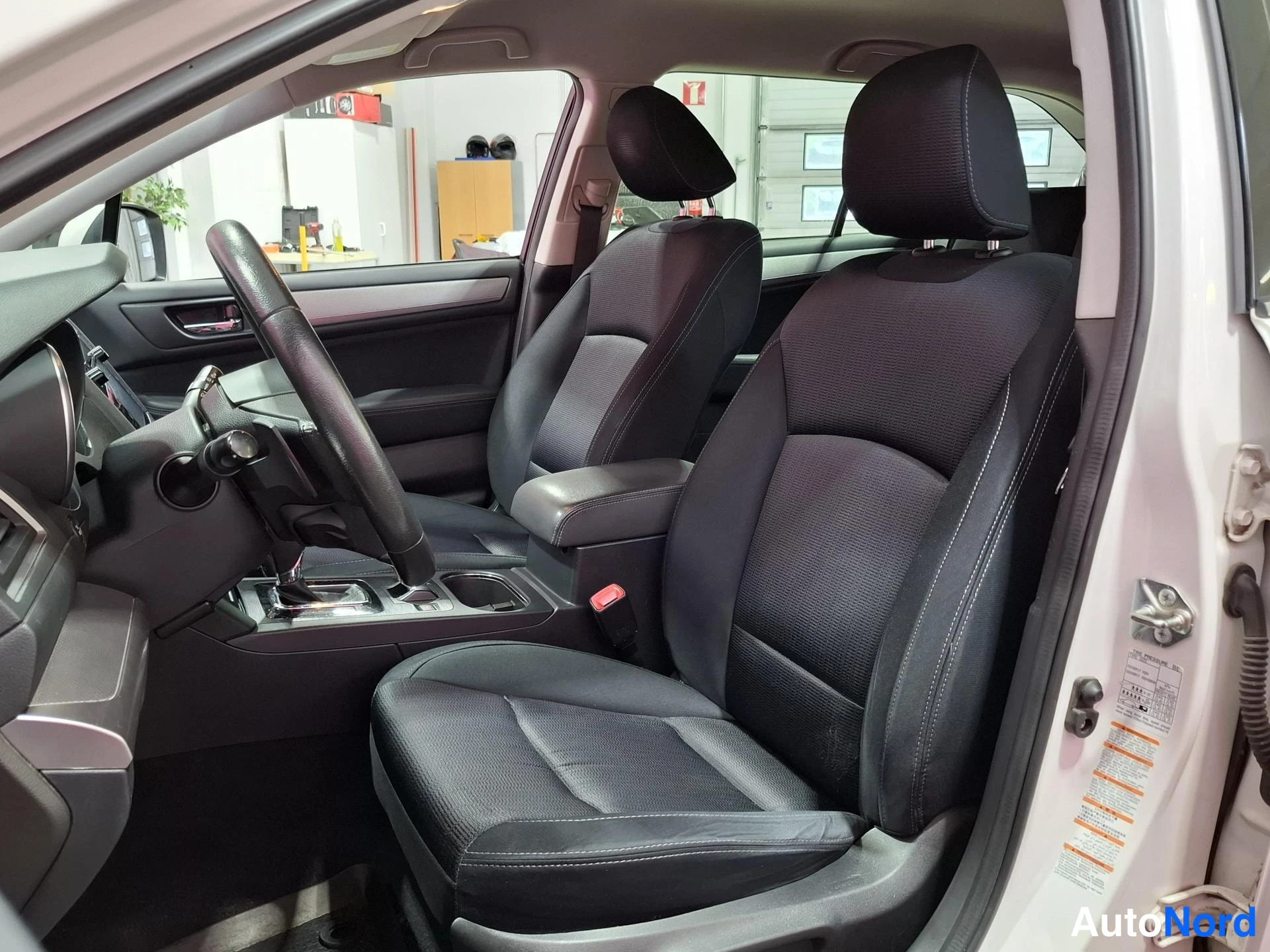 White Subaru Outback 2015, front seats, photo 10