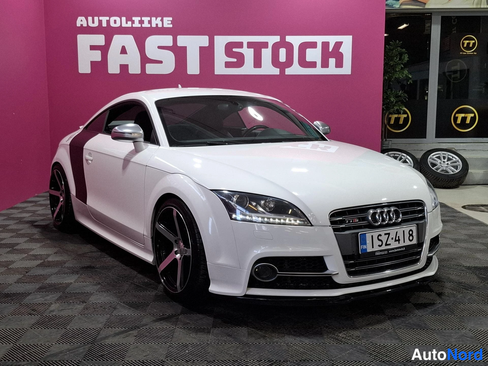 White Audi TTS 2011, front three-quarter, nose to the right, photo 2