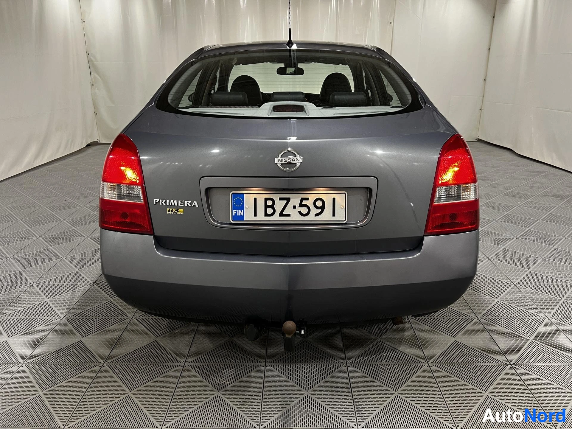 Sininen Nissan Primera 2007, takaa, kuva 6