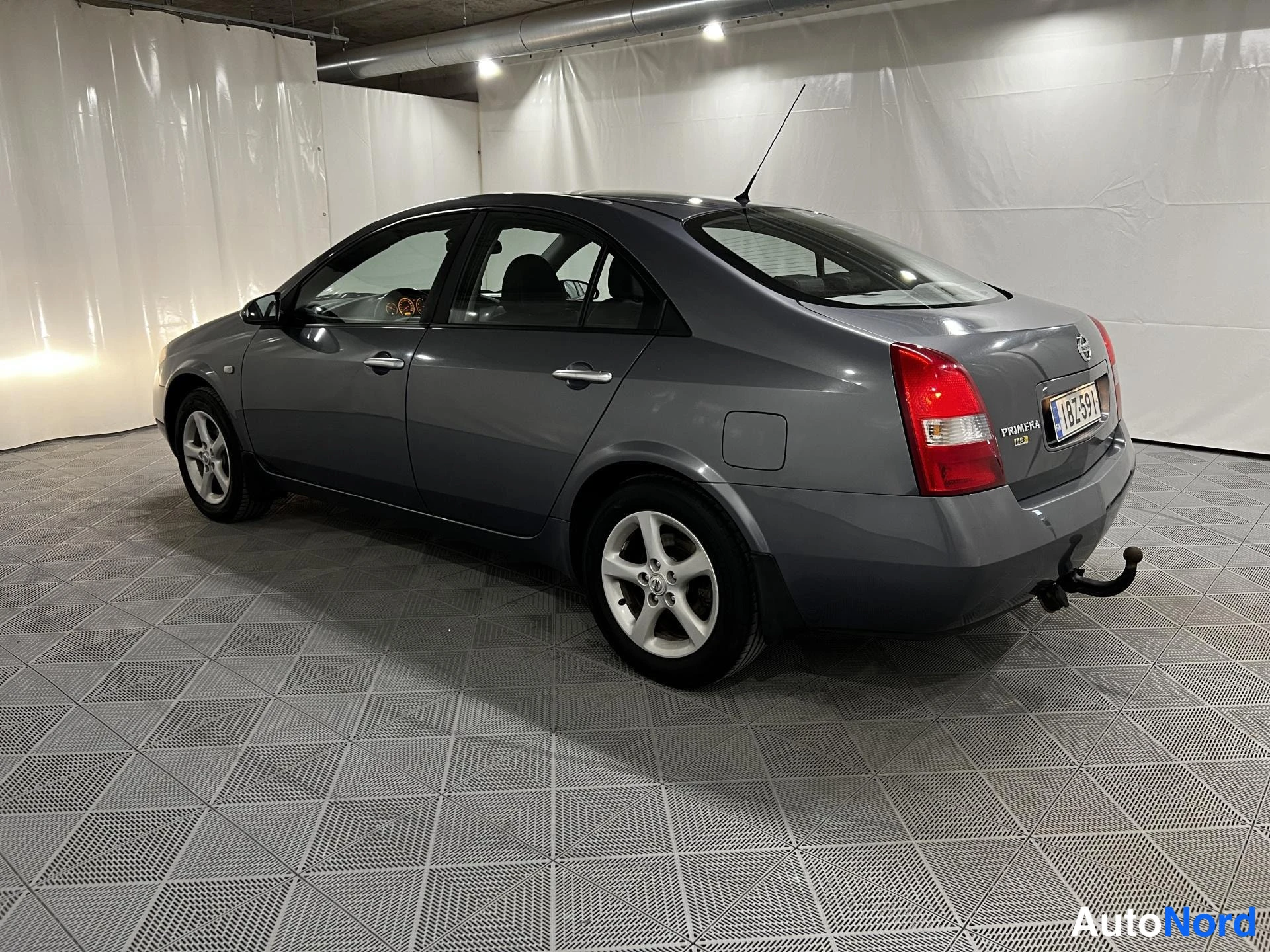 Sininen Nissan Primera 2007, takaviisto, kuva 5