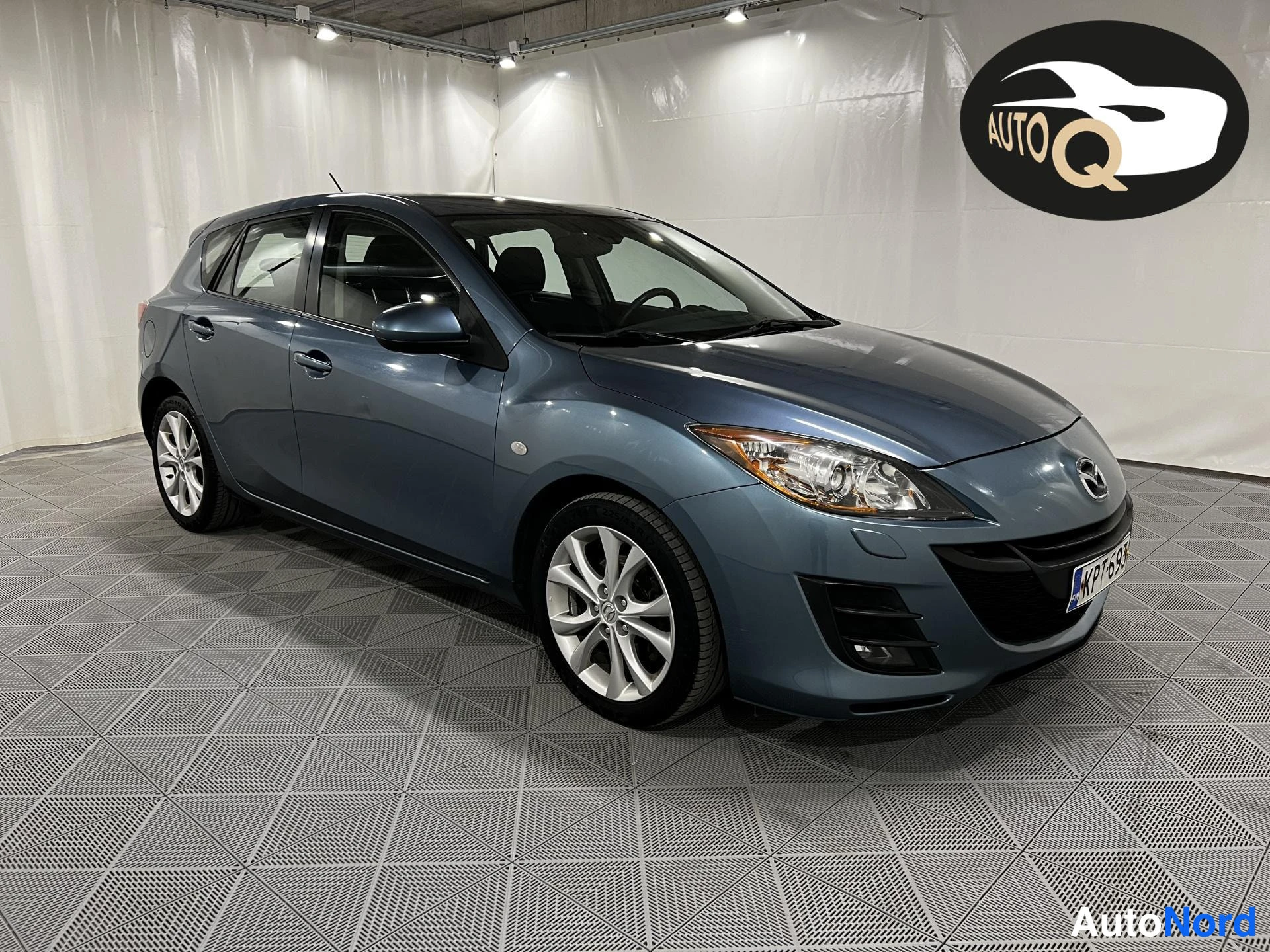 Sininen Mazda 3 2012, etuviisto, keula oikealle, kuva 2