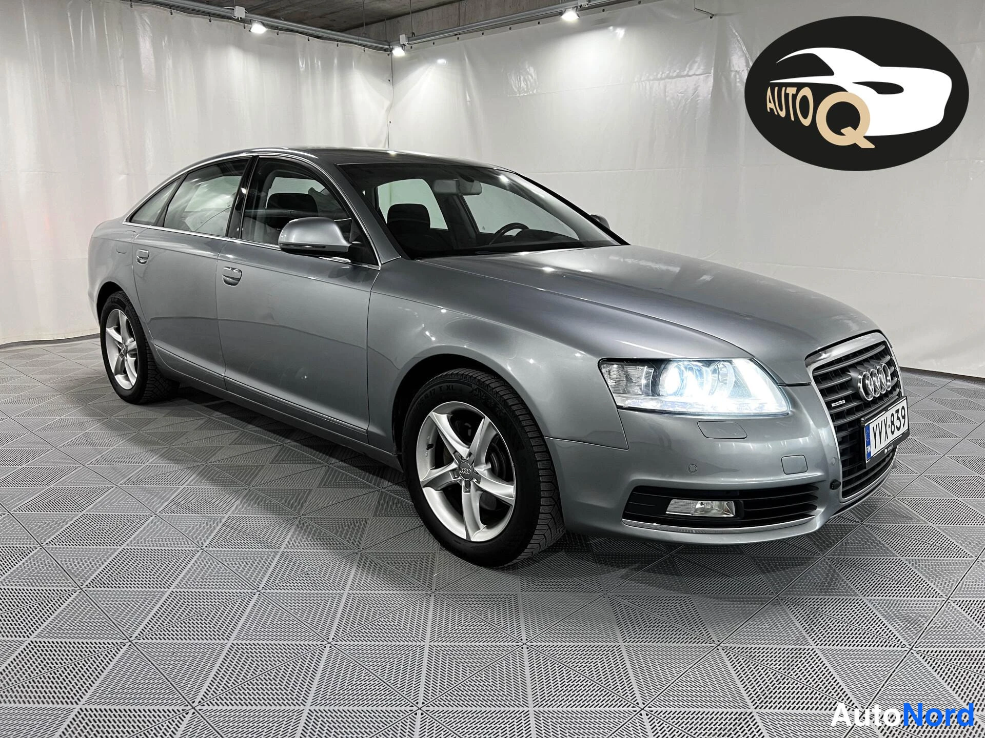 Harmaa Audi A6 2009, etuviisto, keula oikealle, kuva 2