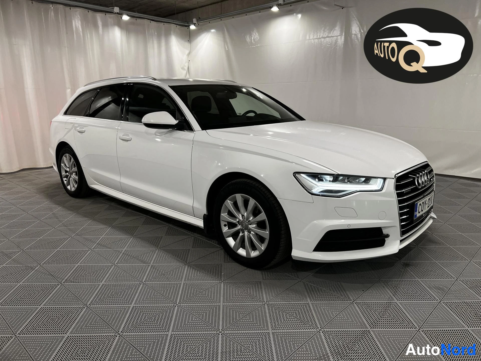 White Audi A6 Avant 2018, front three-quarter, nose to the right, photo 2