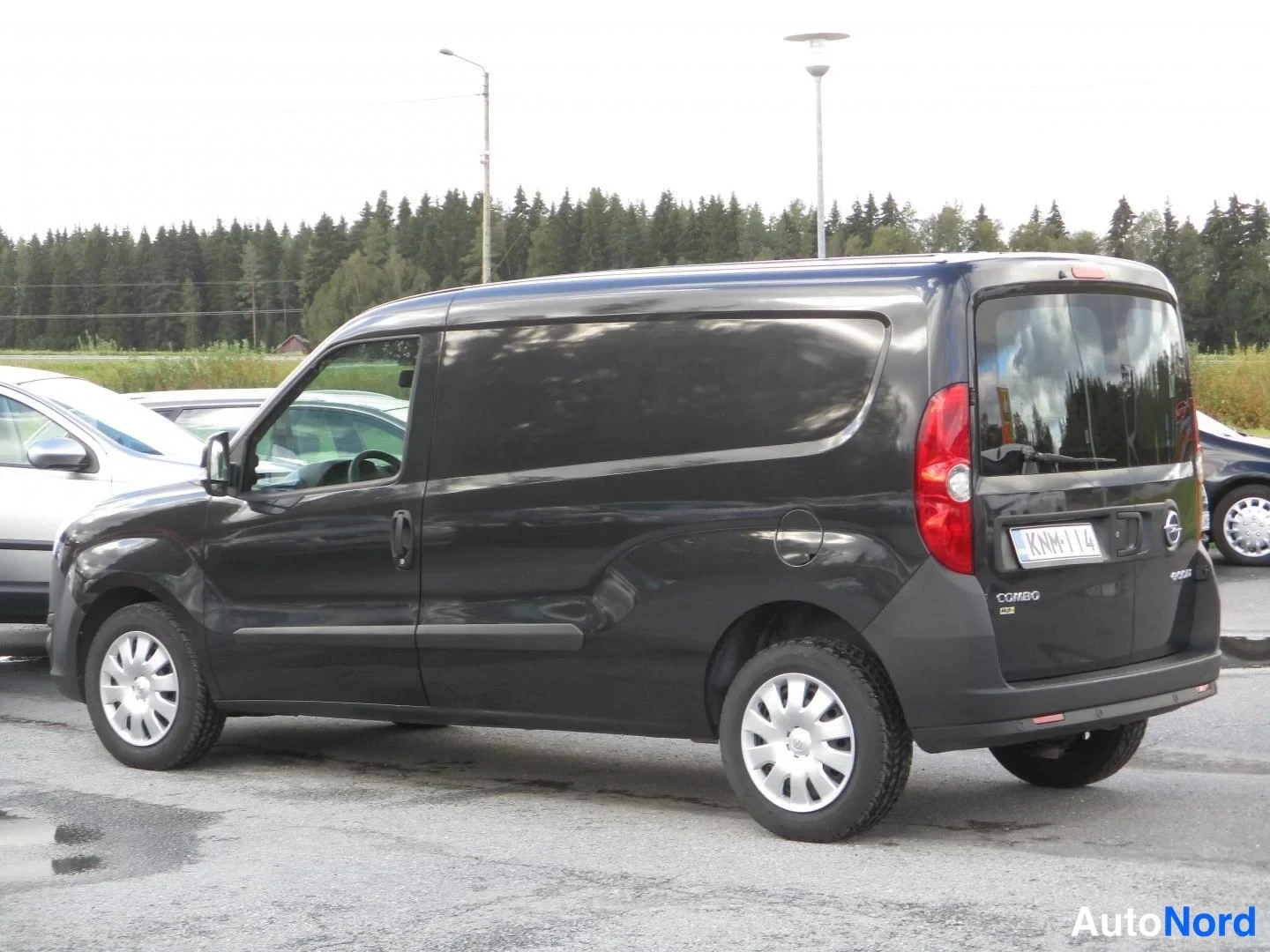 Musta Opel Combo 2016, takaviisto, kuva 6