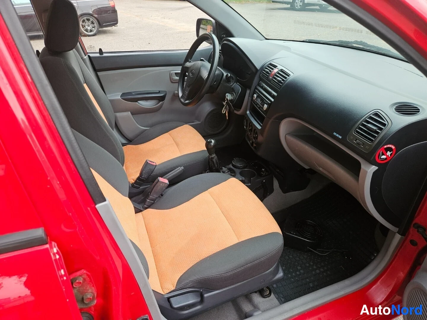 Röd Kia Picanto 2005, förarplats, bild 10