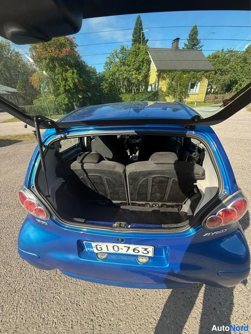 Blå Toyota Aygo 2009, bakifrån, bild 5