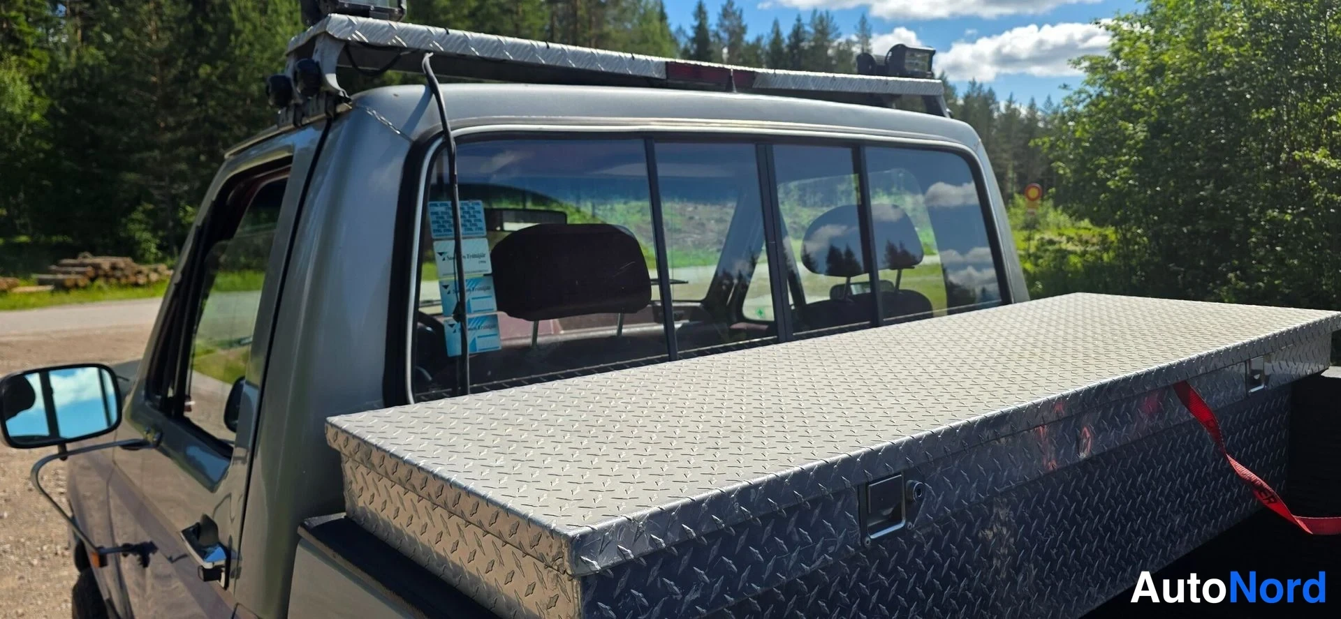 Sininen Ford F-150 1987, sivulta, kuva 10