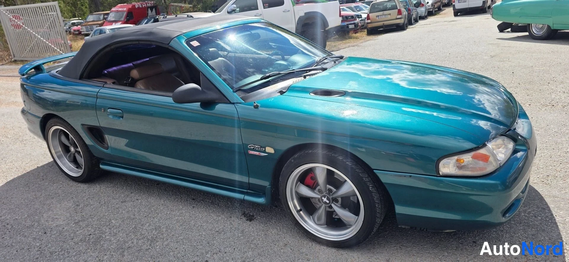 Vihreä Ford Mustang 1997, etuviisto, keula oikealle, kuva 7