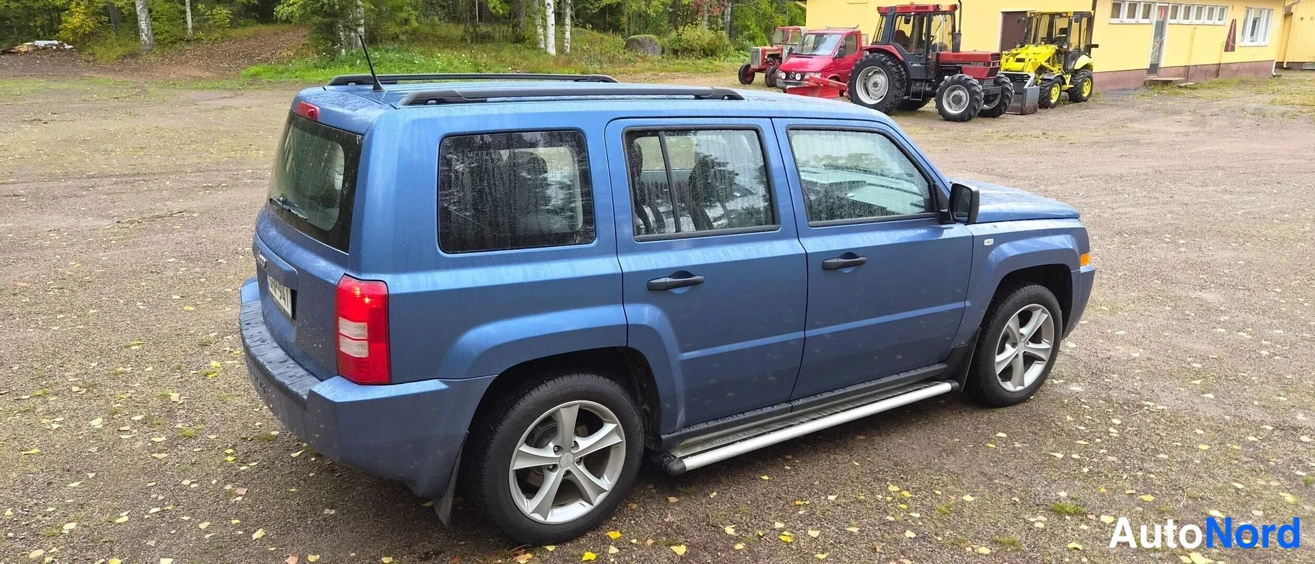 Sininen Jeep Patriot 2010, takaviisto, kuva 7