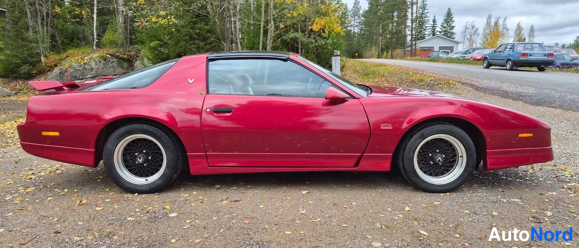 Punainen Pontiac Trans Sport 1988, etuviisto, keula oikealle, kuva 5