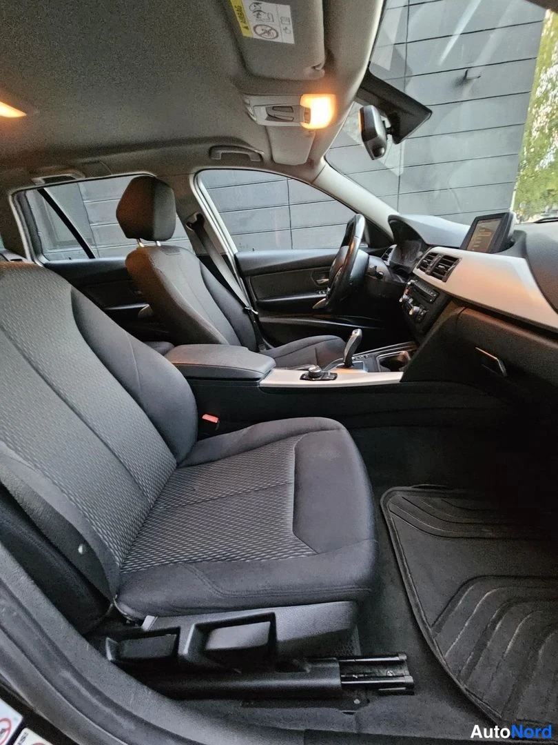 Musta BMW 320i xDrive 2015, etuistuimet, kuva 15